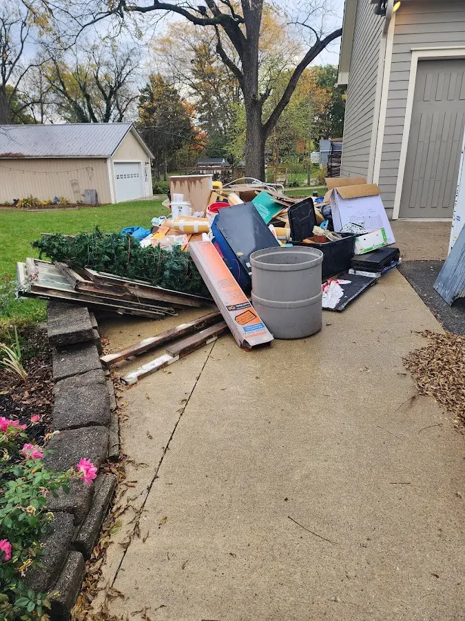 Dumpster being loaded with debris for 3 Yard Dumpster Rental in Pottstown